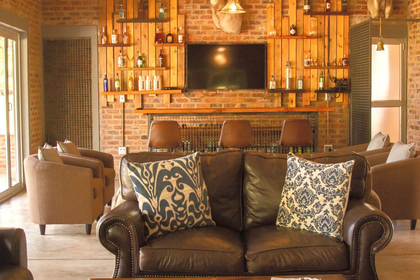 Leather lounge and bar at Mogwele lodge