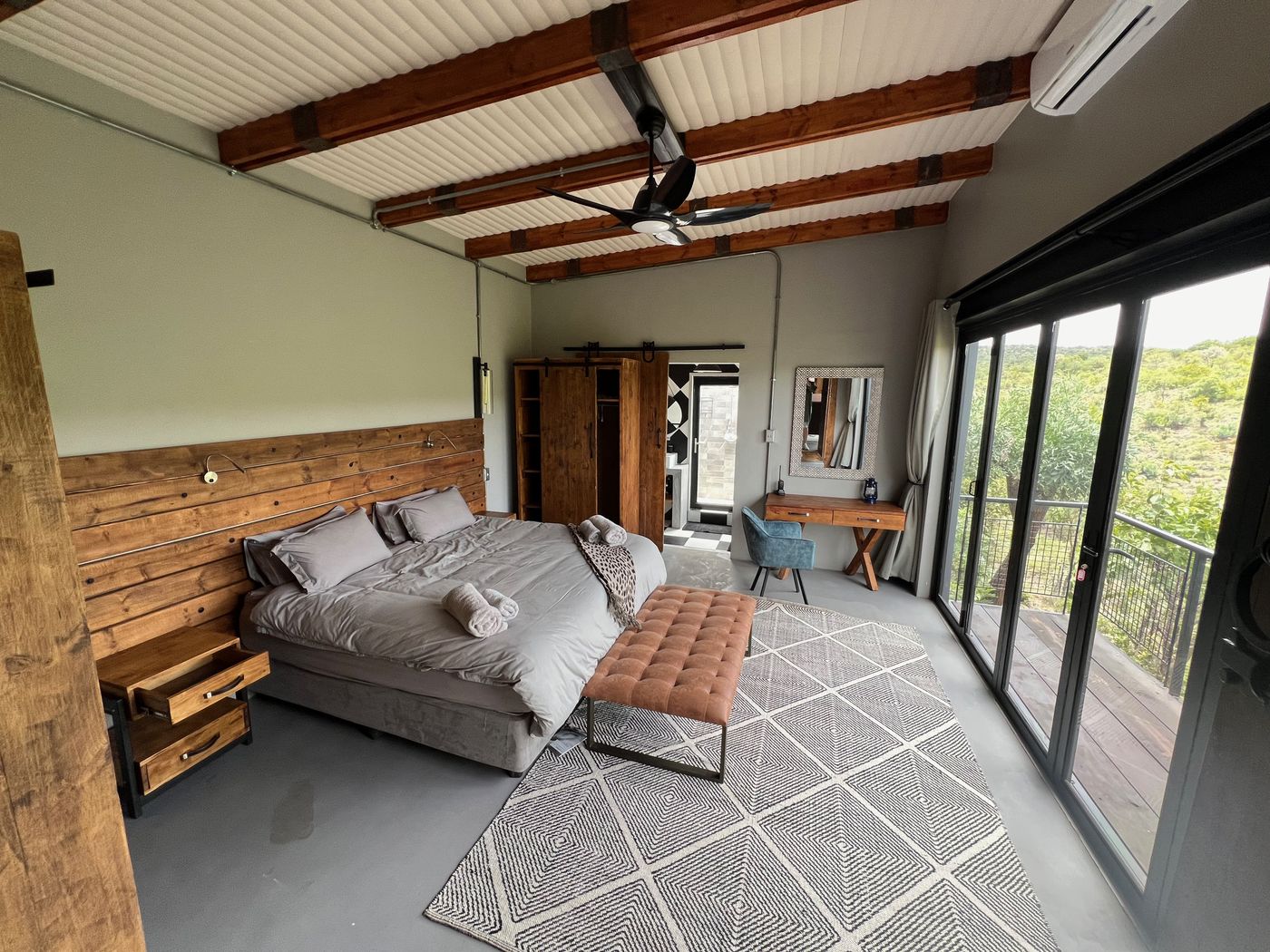 Modern en suite bedroom at a JVZ lodge
