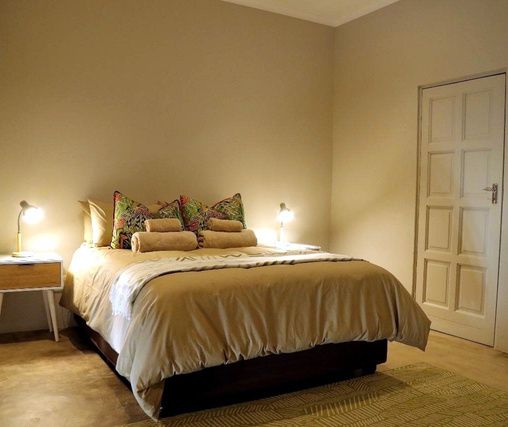 En suite bedroom at a JVZ Safaris lodge